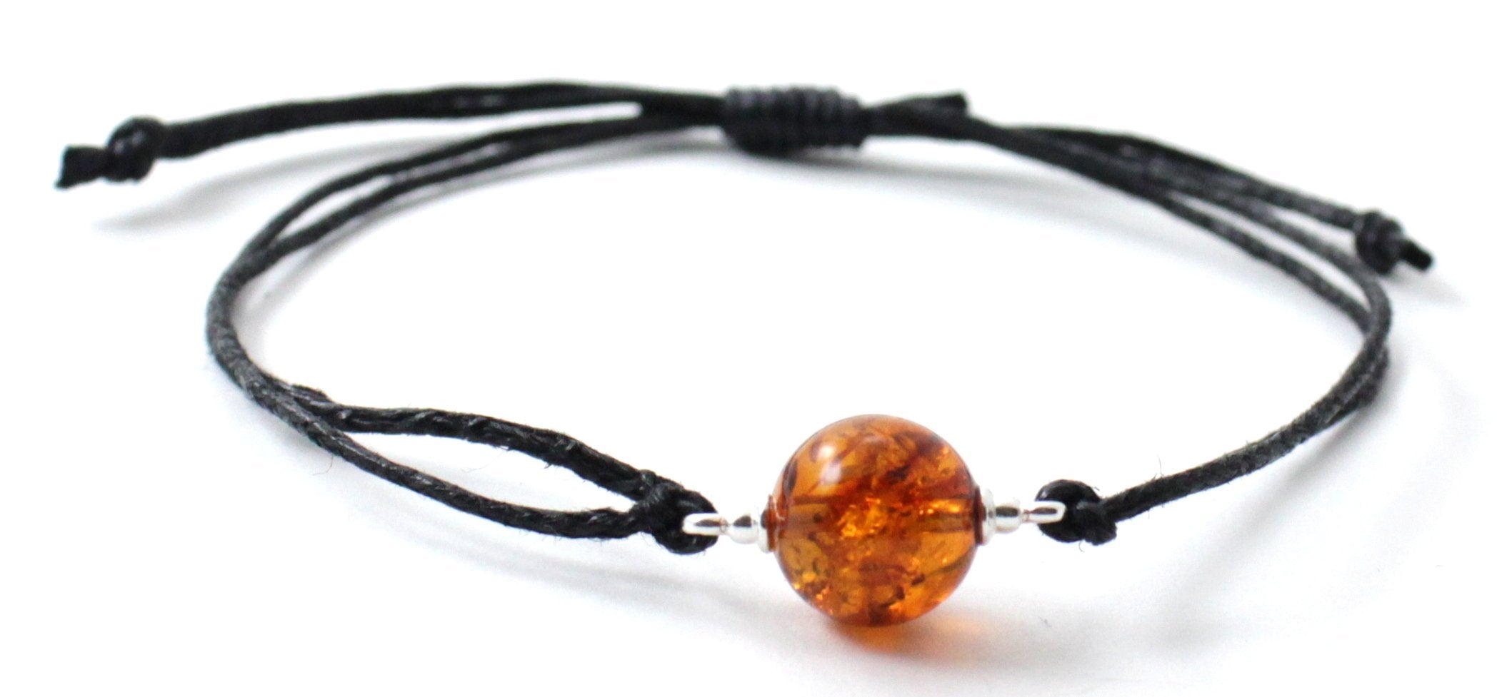 Bracelet réglable avec perle ronde en ambre cognac